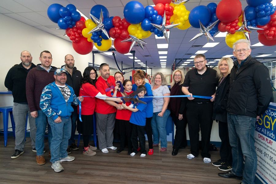Ribbon cutting at We Rock The Spectrum Kid's Gym